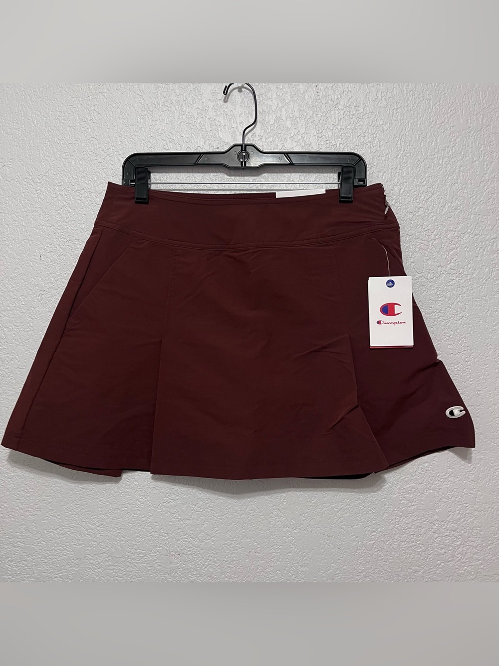 Champion match tennis skorts with a pleated design deep maroon size 10